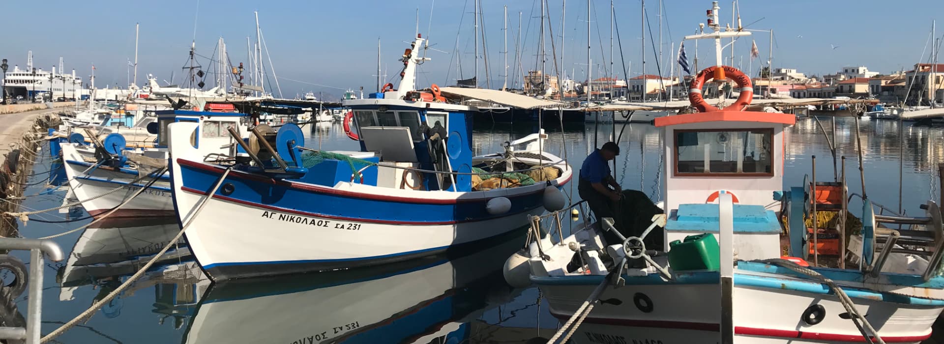 Fishing Boats of Aegina when mooring during a Greece luxury charter